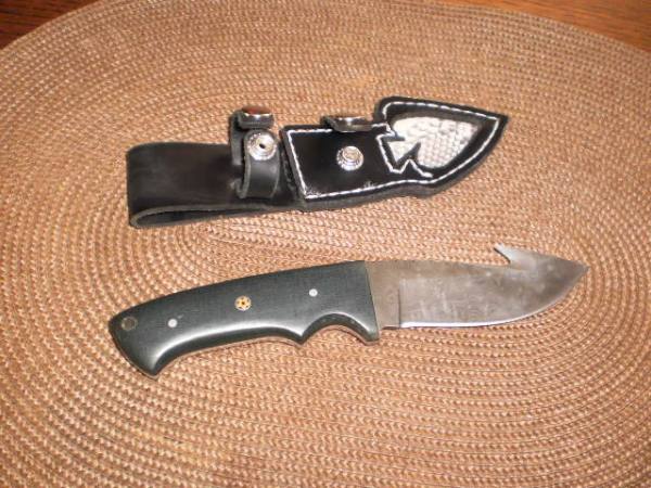 coltello caccia con guthook artigianale n acciaio damasco